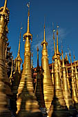 Inle Lake Myanmar. Indein, on the summit of a hill the  Shwe Inn Thein Paya a cluster of hundreds of ancient stupas. Many of them are ruined and overgrown with bushes. 